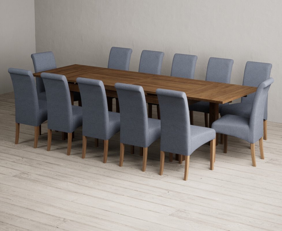 Photo 1 of Extending buxton 180cm rustic solid oak dining table with 12 blue scroll back chairs Photo 1 of Extending buxton 180cm rustic solid oak dining table with 12 blue scroll back chairs