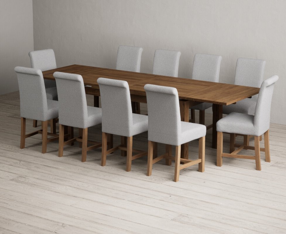 Photo 1 of Extending buxton 180cm rustic solid oak dining table with 10 grey braced chairs Photo 1 of Extending buxton 180cm rustic solid oak dining table with 10 grey braced chairs