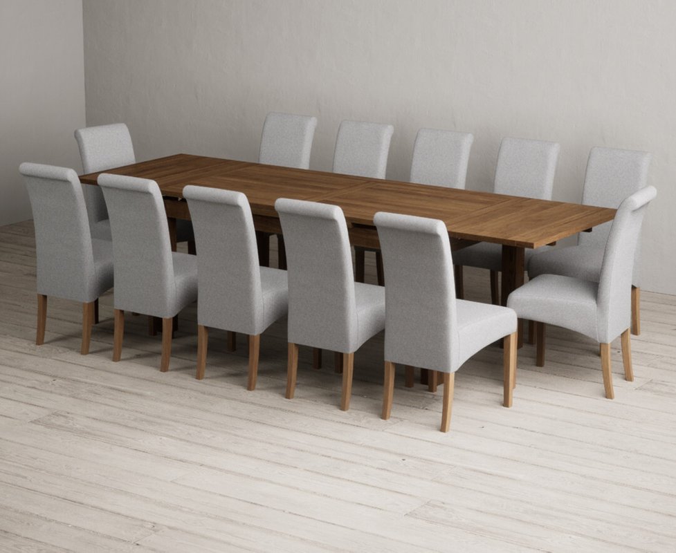 Photo 1 of Extending buxton 180cm rustic solid oak dining table with 12 grey scroll back chairs Photo 1 of Extending buxton 180cm rustic solid oak dining table with 12 grey scroll back chairs