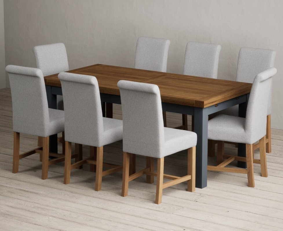 Photo of Extending buxton 180cm oak and dark blue painted dining table with 8 grey braced chairs Photo of Extending buxton 180cm oak and dark blue painted dining table with 8 grey braced chairs