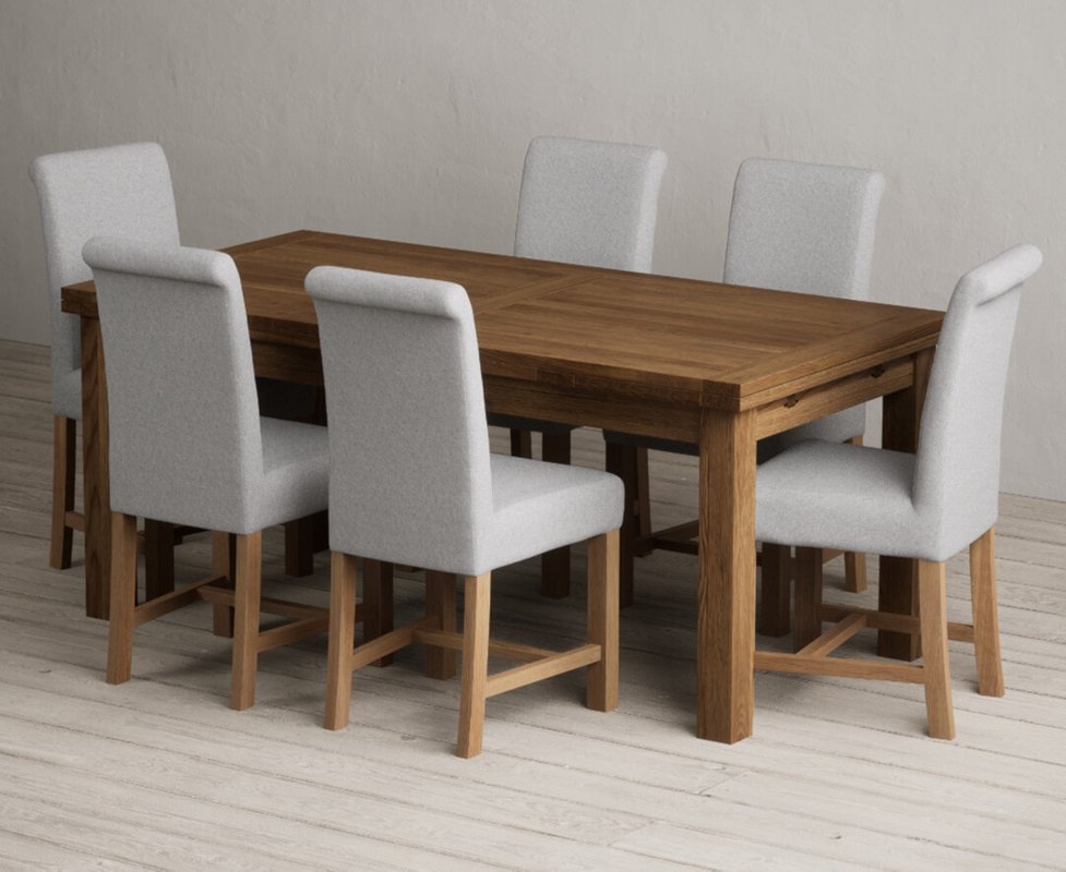 Photo 1 of Extending buxton 180cm rustic solid oak dining table with 6 grey braced chairs Photo 1 of Extending buxton 180cm rustic solid oak dining table with 6 grey braced chairs