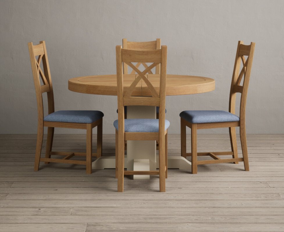 Photo 1 of Extending helmsley oak and cream painted pedestal dining table with 4 blue natural solid oak chairs Photo 1 of Extending helmsley oak and cream painted pedestal dining table with 4 blue natural solid oak chairs