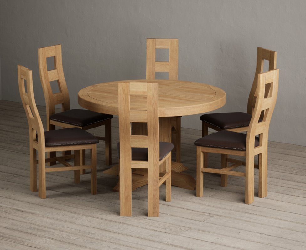 Photo 1 of Extending helmsley solid oak pedestal dining table with 6 brown natural chairs Photo 1 of Extending helmsley solid oak pedestal dining table with 6 brown natural chairs