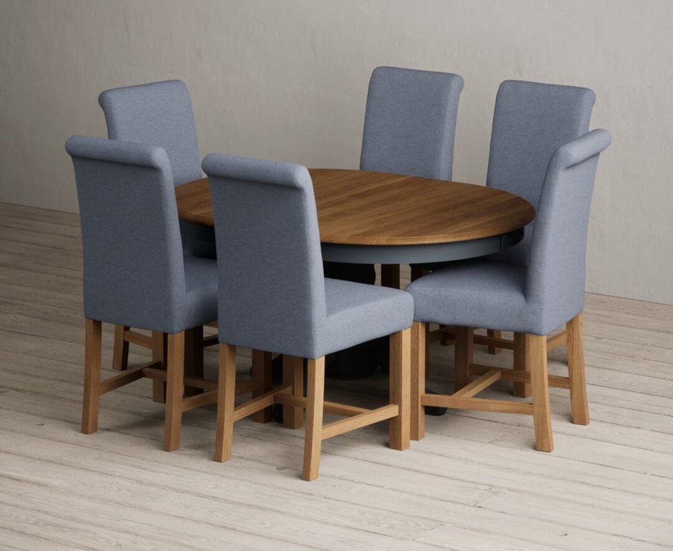 Photo of Extending hertford 100cm - 130cm oak and dark blue painted pedestal dining table with 6 grey braced chairs Photo of Extending hertford 100cm - 130cm oak and dark blue painted pedestal dining table with 6 grey braced chairs