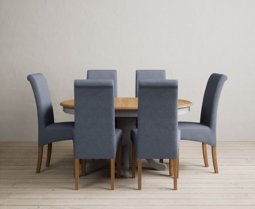 Photo of Extending hertford 100cm - 130cm oak and light grey painted pedestal dining table with 6 blue scroll back chairs Photo of Extending hertford 100cm - 130cm oak and light grey painted pedestal dining table with 6 blue scroll back chairs
