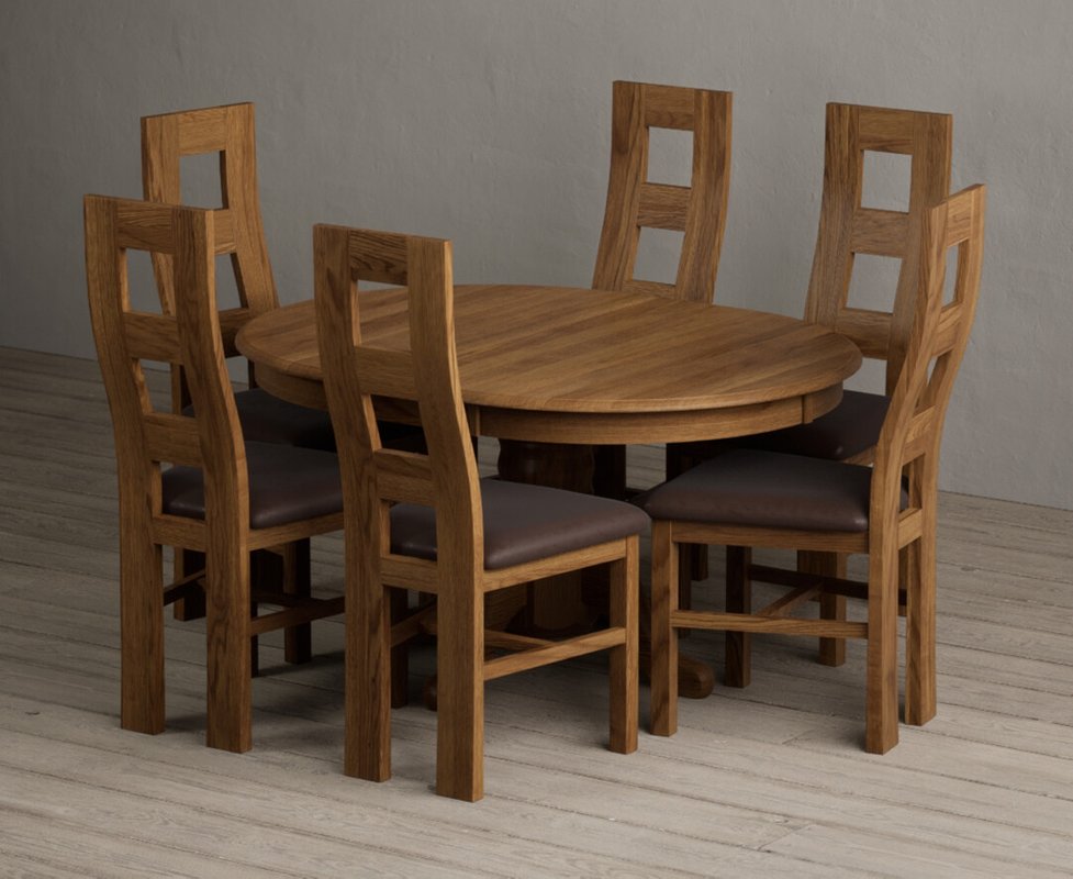 Photo 1 of Extending hertford 100cm - 130cm rustic oak pedestal dining table with 6 brown rustic solid oak chairs Photo 1 of Extending hertford 100cm - 130cm rustic oak pedestal dining table with 6 brown rustic solid oak chairs