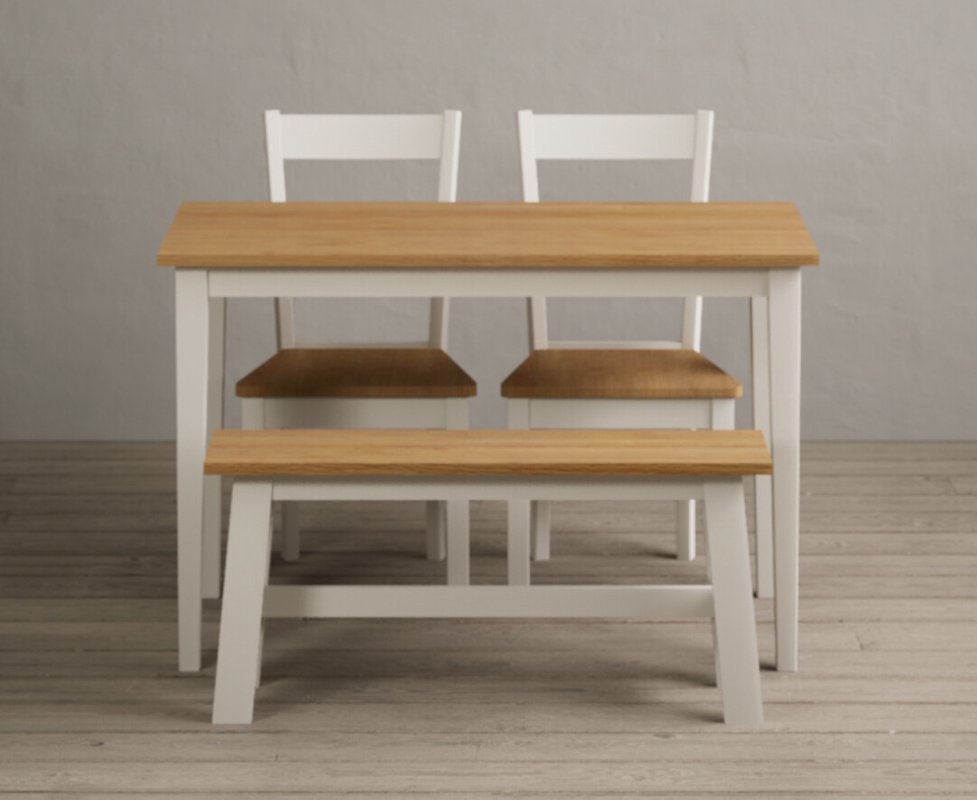 Photo of Kendal 115cm solid oak and cream painted dining table with 4 brown kendal chairs with 2 cream benches Photo of Kendal 115cm solid oak and cream painted dining table with 4 brown kendal chairs with 2 cream benches