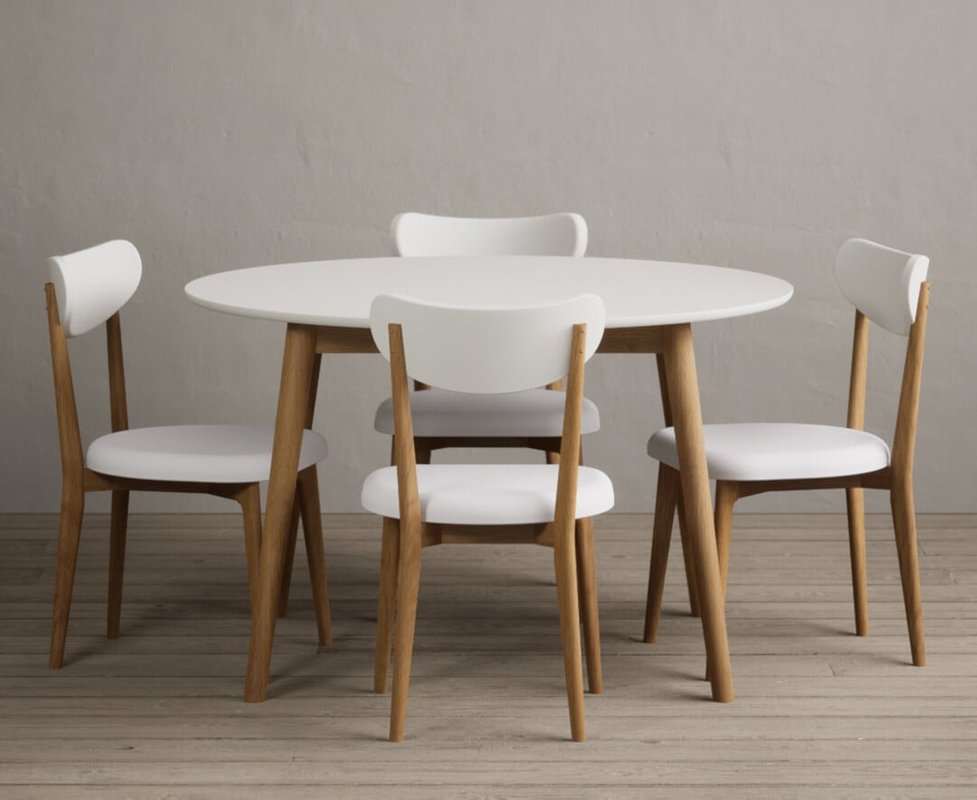 Photo of Nordic 120cm round solid oak and signal white painted dining table with 4 white nordic chairs Photo of Nordic 120cm round solid oak and signal white painted dining table with 4 white nordic chairs