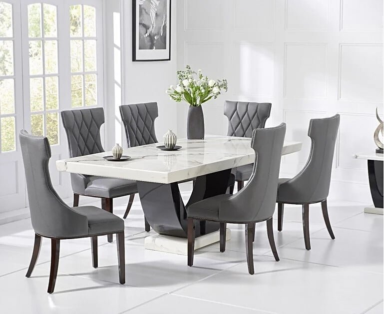 Photo of Novara 200cm white and black pedestal marble dining table with 12 cream sophia chairs Photo of Novara 200cm white and black pedestal marble dining table with 12 cream sophia chairs