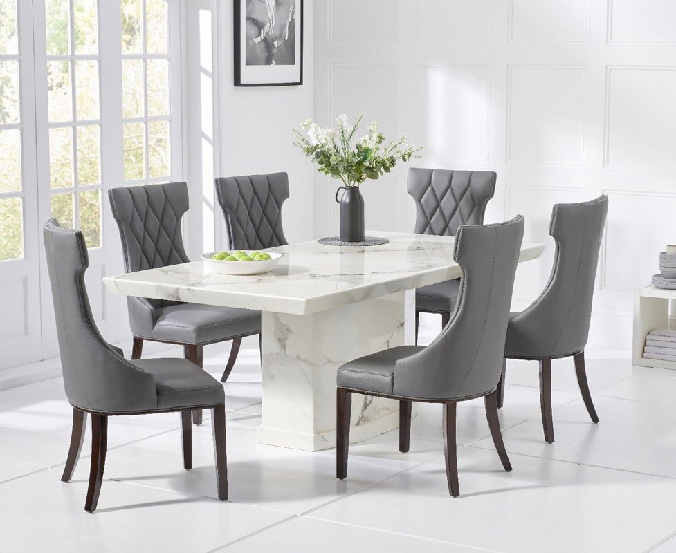 Photo of Carvelle 200cm white pedestal marble dining table with 10 grey sophia chairs Photo of Carvelle 200cm white pedestal marble dining table with 10 grey sophia chairs