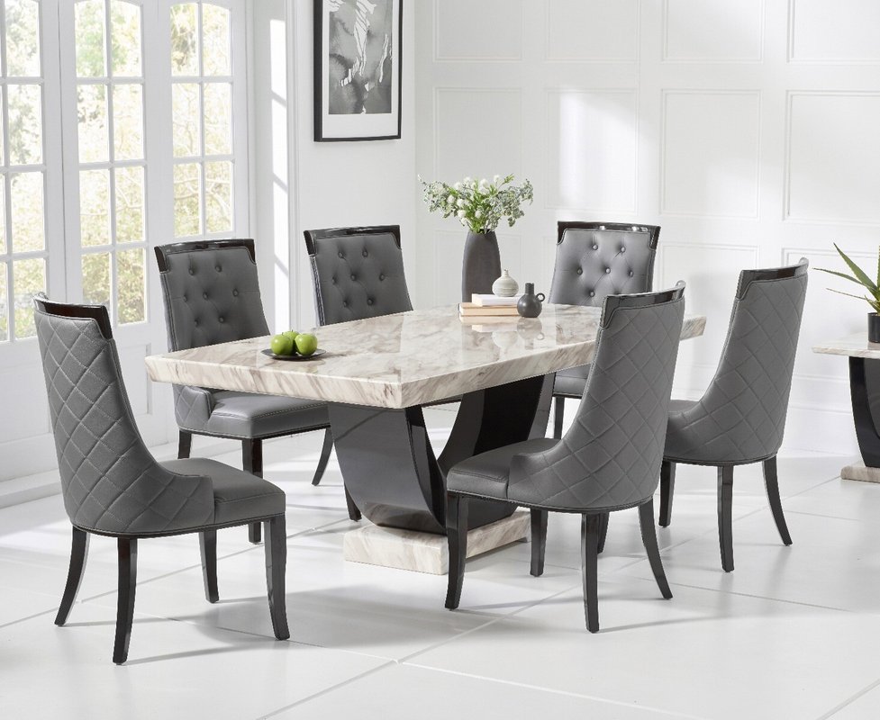 Photo of Novara 170cm cream and black pedestal marble dining table with 4 grey francesca chairs Photo of Novara 170cm cream and black pedestal marble dining table with 4 grey francesca chairs