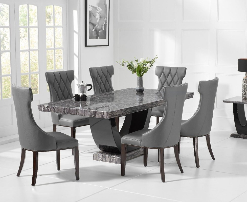 Photo of Novara 200cm dark grey pedestal marble dining table with 12 cream sophia chairs Photo of Novara 200cm dark grey pedestal marble dining table with 12 cream sophia chairs