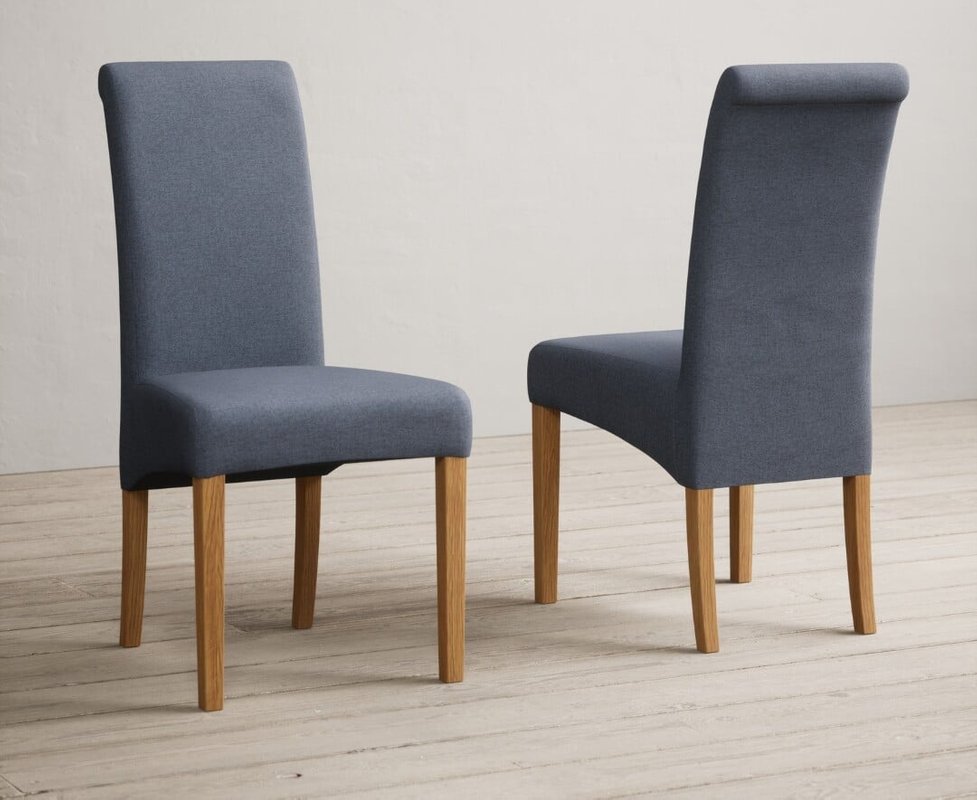 Photo of Extending buxton 140cm oak and soft white painted dining table with 8 charcoal grey scroll back chairs Photo of Extending buxton 140cm oak and soft white painted dining table with 8 charcoal grey scroll back chairs