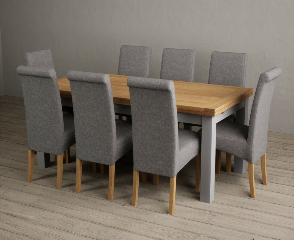 Photo of Extending buxton 180cm oak and light grey painted dining table with 12 natural scroll back chairs Photo of Extending buxton 180cm oak and light grey painted dining table with 12 natural scroll back chairs
