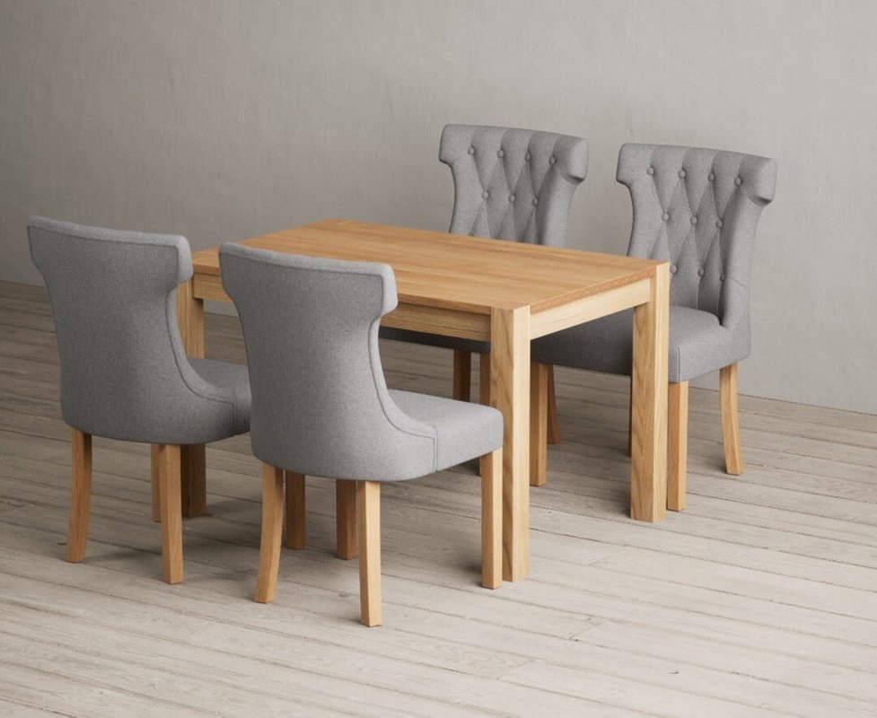 Photo of Thetford 120cm solid oak dining table with 4 grey clara chairs Photo of Thetford 120cm solid oak dining table with 4 grey clara chairs