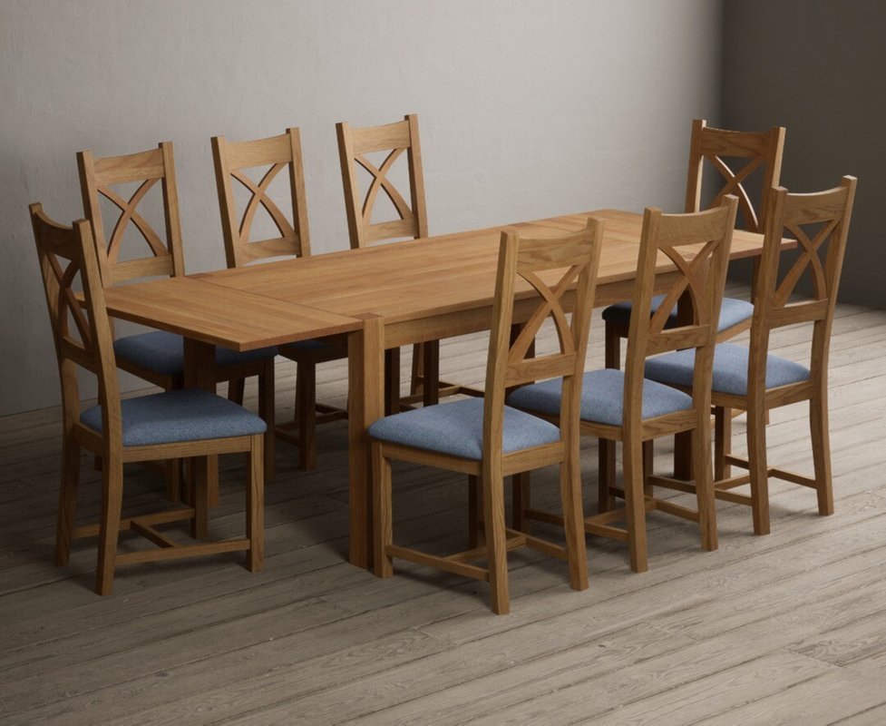 Photo 1 of Extending thetford 150cm solid oak dining table with 8 blue natural solid oak chairs Photo 1 of Extending thetford 150cm solid oak dining table with 8 blue natural solid oak chairs