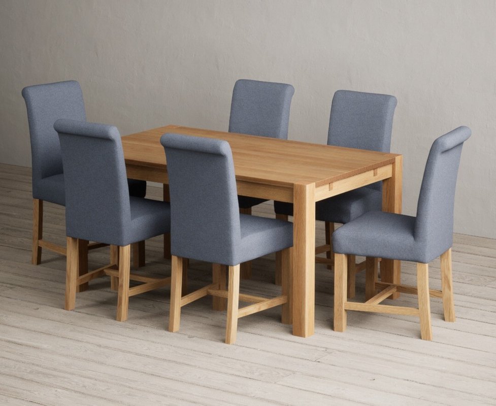 Photo 1 of Thetford 150cm solid oak dining table with 6 blue braced chairs Photo 1 of Thetford 150cm solid oak dining table with 6 blue braced chairs