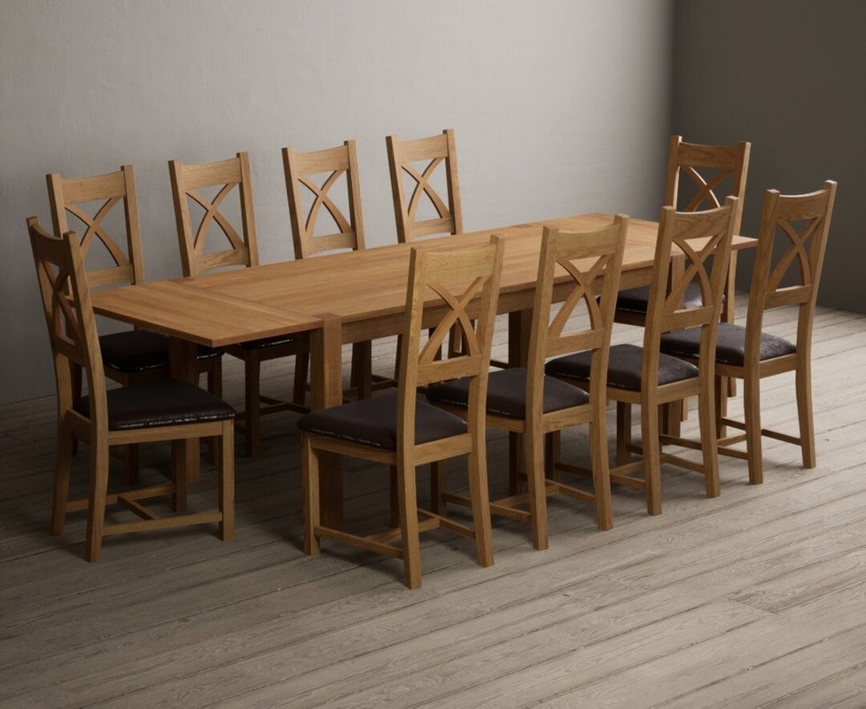 Photo 1 of Extending thetford 180cm solid oak dining table with 10 brown natural solid oak chairs Photo 1 of Extending thetford 180cm solid oak dining table with 10 brown natural solid oak chairs