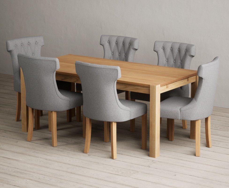 Photo 1 of Thetford 180cm solid oak dining table with 6 grey clara chairs Photo 1 of Thetford 180cm solid oak dining table with 6 grey clara chairs