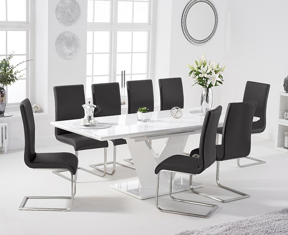 Photo 1 of Extending vittorio 160cm white high gloss dining table with 8 black austin chairs Photo 1 of Extending vittorio 160cm white high gloss dining table with 8 black austin chairs
