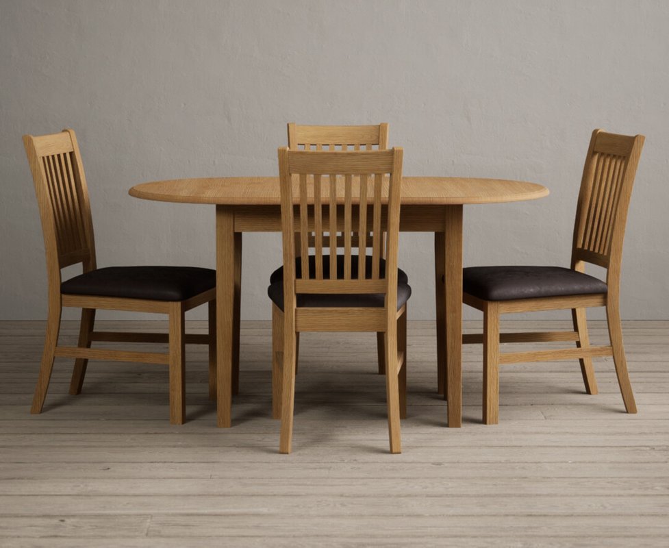 Photo 1 of Extending warwick solid oak dining table with 4 brown warwick chairs Photo 1 of Extending warwick solid oak dining table with 4 brown warwick chairs