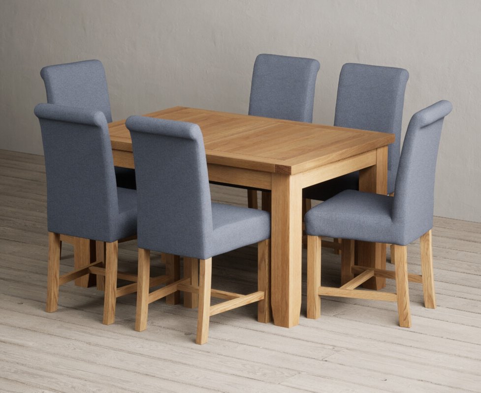 Photo 1 of Extending yateley 130cm solid oak dining table with 6 blue braced chairs Photo 1 of Extending yateley 130cm solid oak dining table with 6 blue braced chairs
