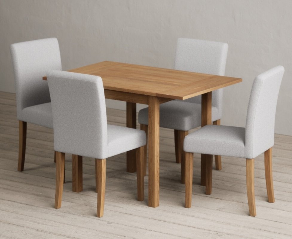 Photo 1 of Extending york 70cm solid oak dining table with 4 grey lila chairs Photo 1 of Extending york 70cm solid oak dining table with 4 grey lila chairs