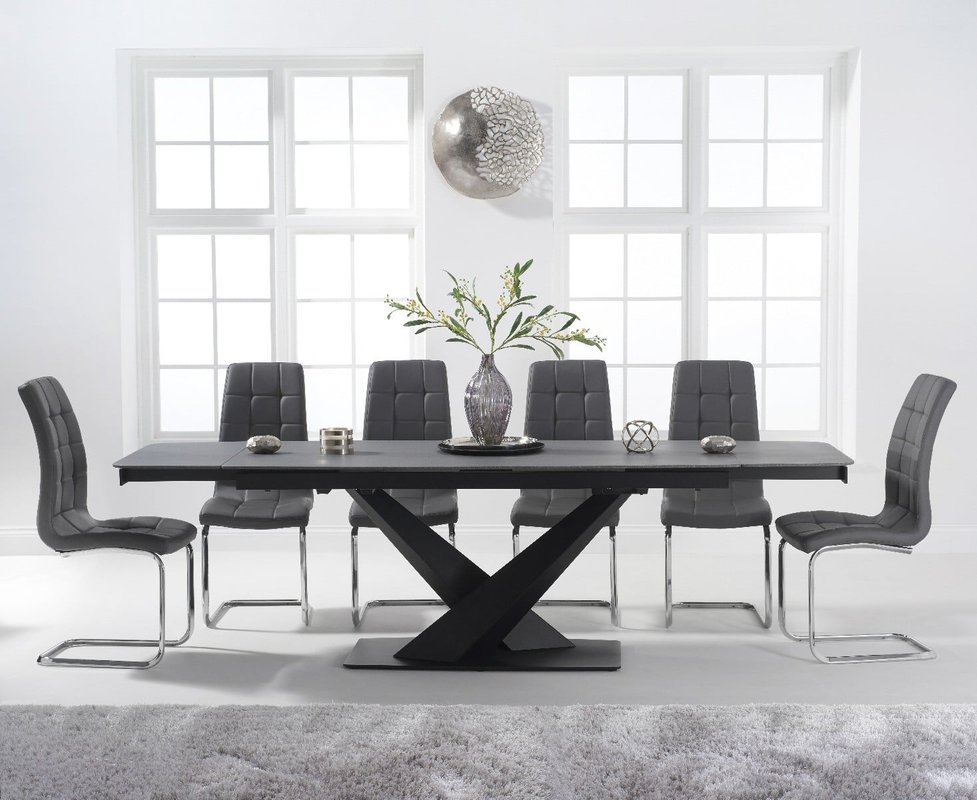 Photo of Extending jacob 180cm grey stone dining table with 6 white vigo chairs Photo of Extending jacob 180cm grey stone dining table with 6 white vigo chairs