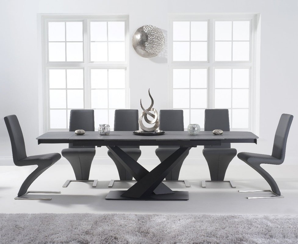 Photo of Extending jacob 180cm grey stone dining table with 8 black aldo chairs Photo of Extending jacob 180cm grey stone dining table with 8 black aldo chairs