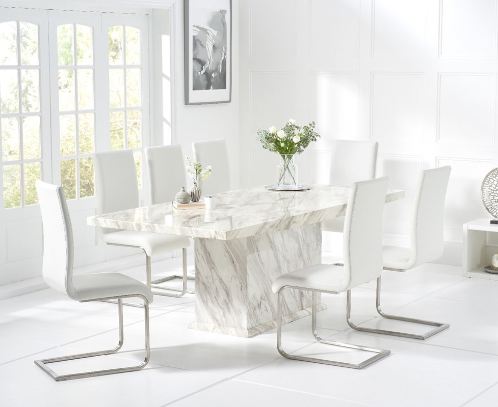 Photo of Marino 220cm marble dining table with 10 white malaga chairs Photo of Marino 220cm marble dining table with 10 white malaga chairs