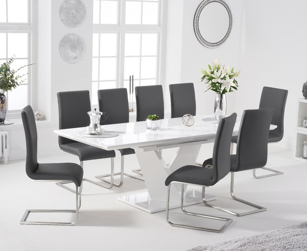 Photo of Extending vittorio 160cm white high gloss dining table with 6 white austin chairs Photo of Extending vittorio 160cm white high gloss dining table with 6 white austin chairs