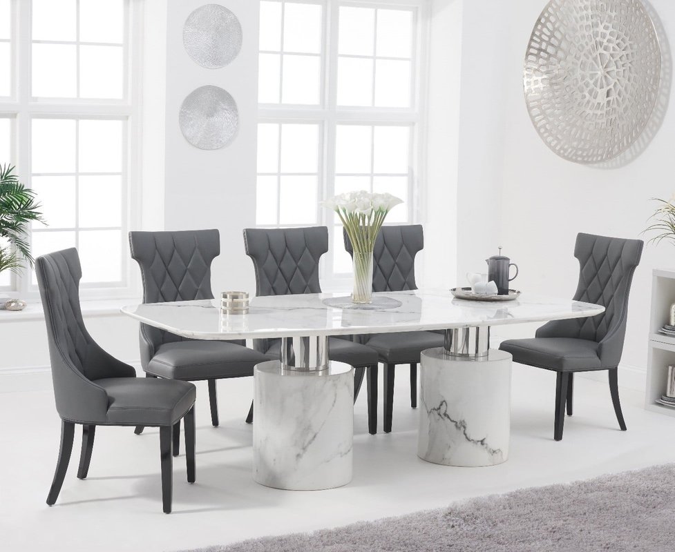 Photo of Antonio 220cm white marble dining table with 10 grey sophia chairs Photo of Antonio 220cm white marble dining table with 10 grey sophia chairs
