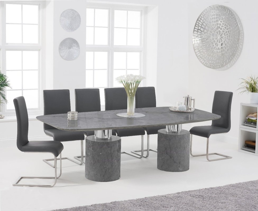 Photo of Antonio 220cm grey marble dining table with 10 white austin chairs Photo of Antonio 220cm grey marble dining table with 10 white austin chairs