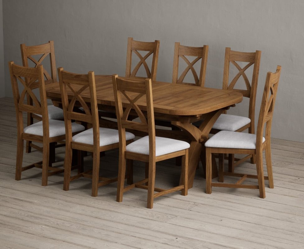 Photo of Extending olympia 180cm rustic solid oak dining table with 12 linen rustic solid oak chairs Photo of Extending olympia 180cm rustic solid oak dining table with 12 linen rustic solid oak chairs