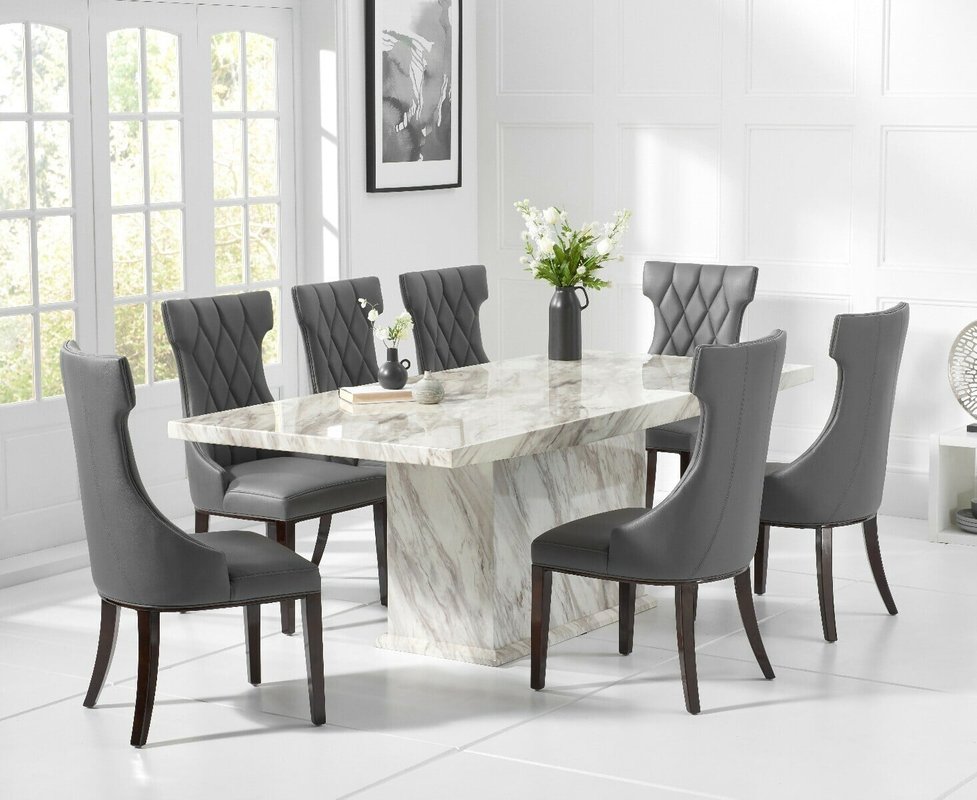 Photo of Marino 180cm marble dining table with 10 cream sophia chairs Photo of Marino 180cm marble dining table with 10 cream sophia chairs