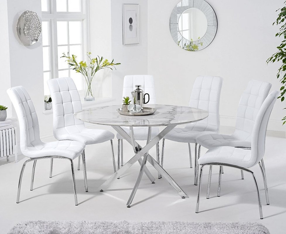 Photo of Comiso 120cm round white marble dining table with 4 white enzo chairs Photo of Comiso 120cm round white marble dining table with 4 white enzo chairs