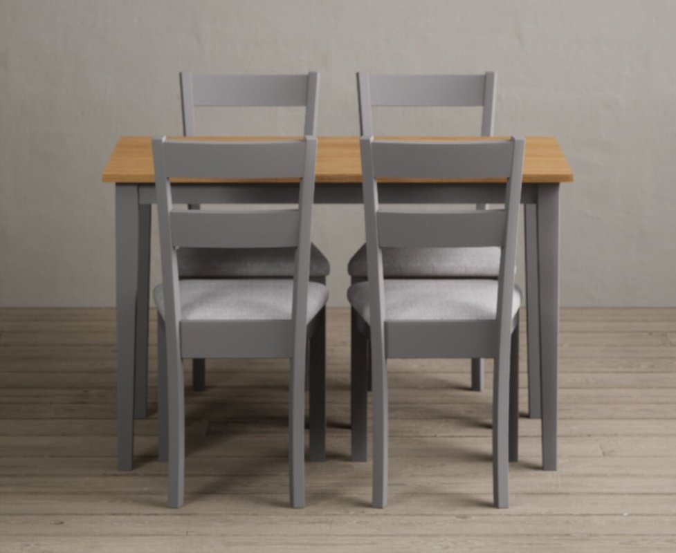 Photo of Kendal 115cm solid oak and light grey painted dining table with 4 light grey kendal chairs Photo of Kendal 115cm solid oak and light grey painted dining table with 4 light grey kendal chairs