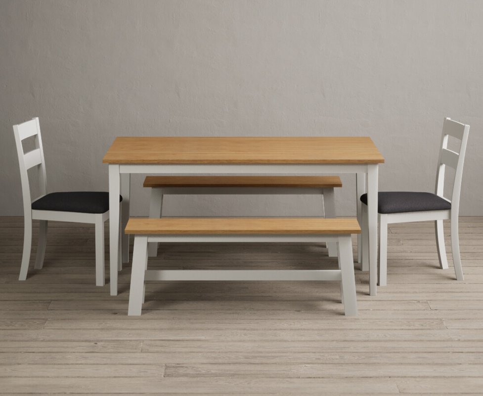 Photo of Kendal 150cm solid oak and signal white painted dining table with 2 blue kendal chairs with 2 oak and white benches Photo of Kendal 150cm solid oak and signal white painted dining table with 2 blue kendal chairs with 2 oak and white benches