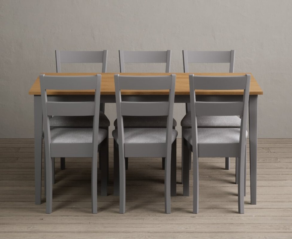 Photo of Kendal 150cm solid oak and light grey painted dining table with 4 light grey kendal chairs Photo of Kendal 150cm solid oak and light grey painted dining table with 4 light grey kendal chairs