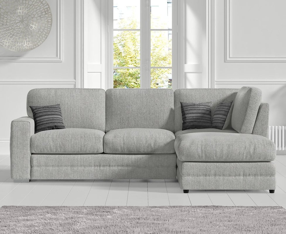 Photo of Madden light grey fabric right hand facing corner sofa Photo of Madden light grey fabric right hand facing corner sofa