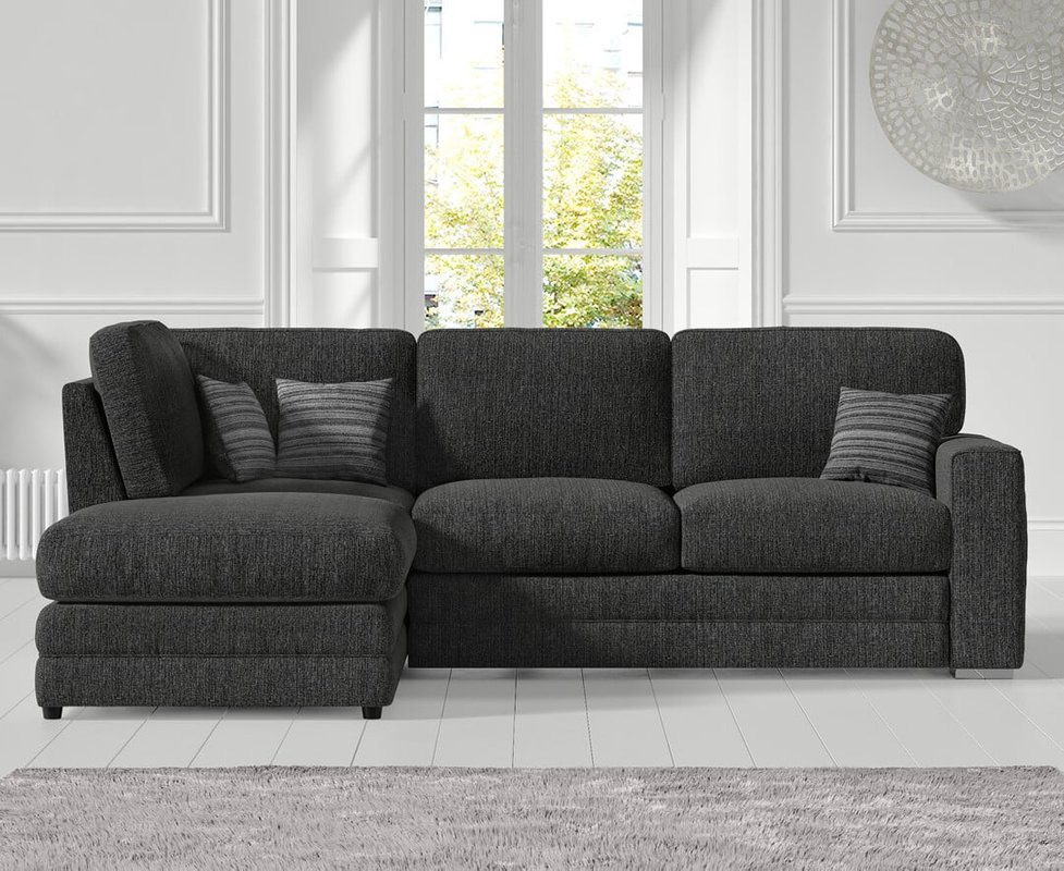 Photo of Madden charcoal grey fabric left hand facing corner sofa Photo of Madden charcoal grey fabric left hand facing corner sofa