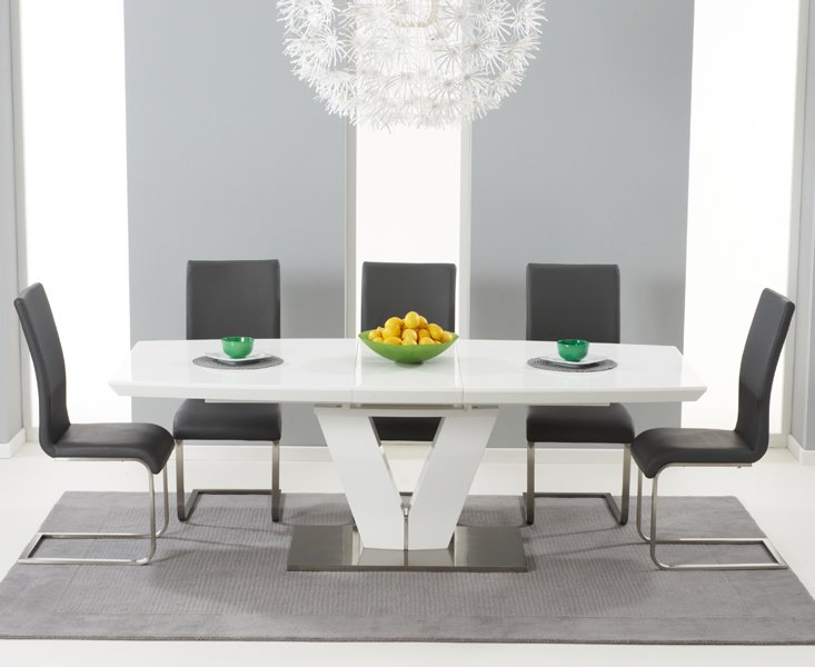 Photo of Extending palermo 180cm white high gloss dining table with 10 white austin chairs Photo of Extending palermo 180cm white high gloss dining table with 10 white austin chairs