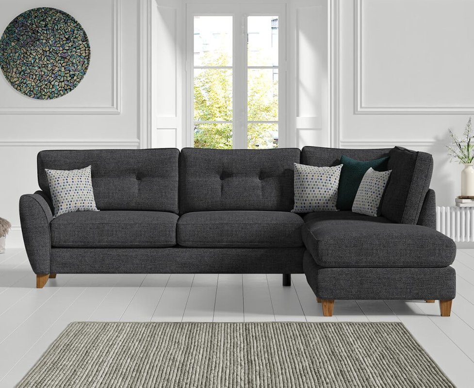 Photo of Florin charcoal grey fabric right hand facing corner chaise sofa Photo of Florin charcoal grey fabric right hand facing corner chaise sofa