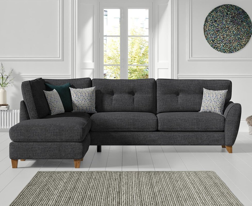 Photo of Florin charcoal grey fabric left hand facing corner chaise sofa Photo of Florin charcoal grey fabric left hand facing corner chaise sofa