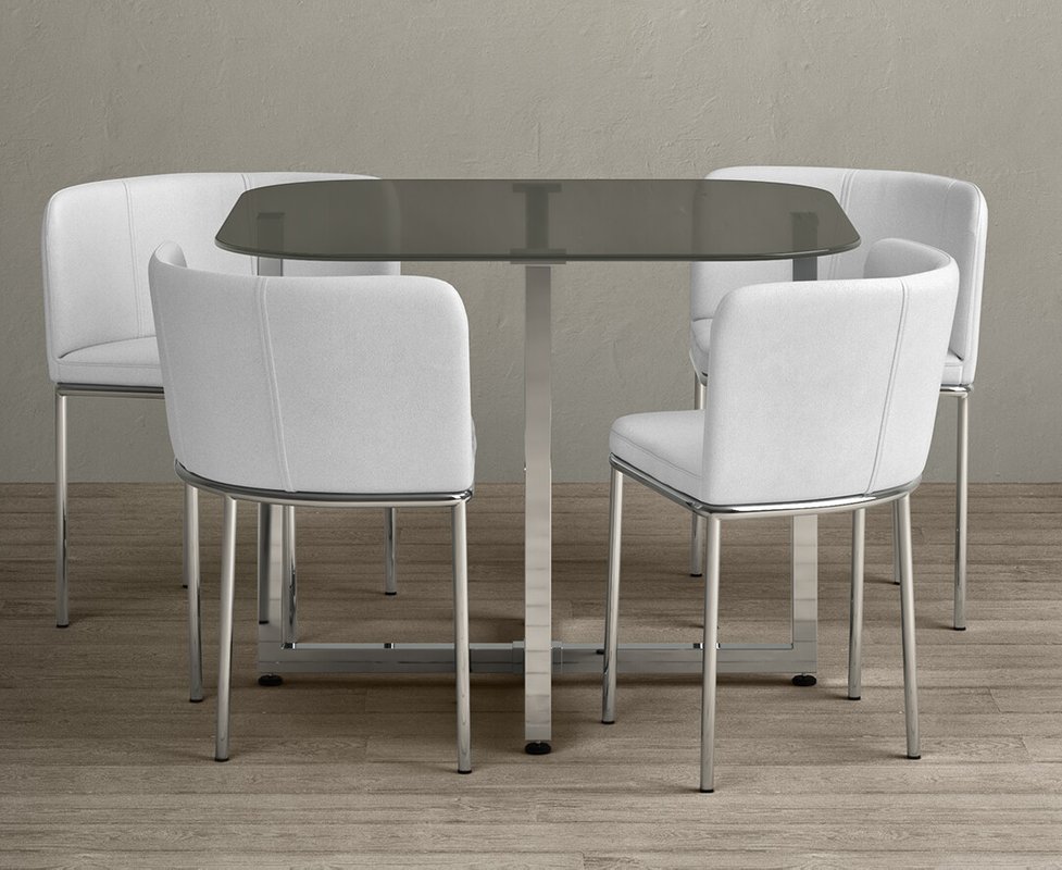 Photo of Rhodes grey glass dining table with 4 white rhodes chairs Photo of Rhodes grey glass dining table with 4 white rhodes chairs