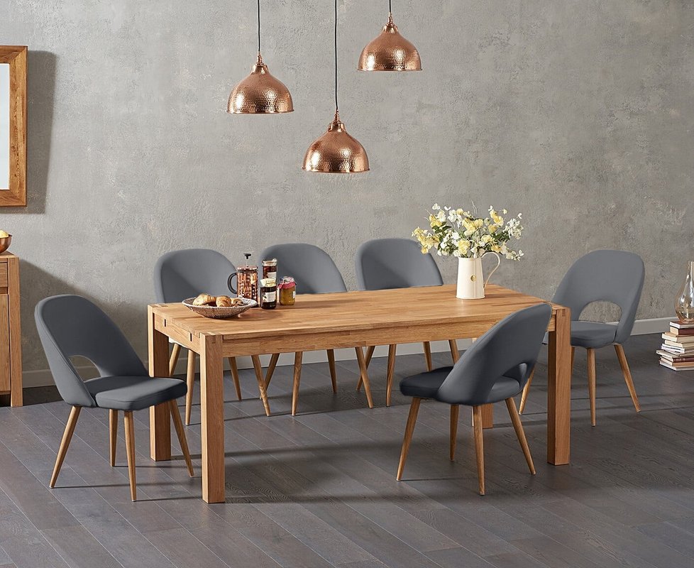 Photo of Thetford 180cm oak dining table with 8 grey hudson chairs Photo of Thetford 180cm oak dining table with 8 grey hudson chairs