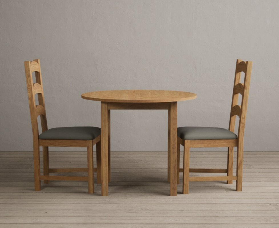 Photo of Extending york 90cm solid oak dining table with 2 black alton chairs Photo of Extending york 90cm solid oak dining table with 2 black alton chairs