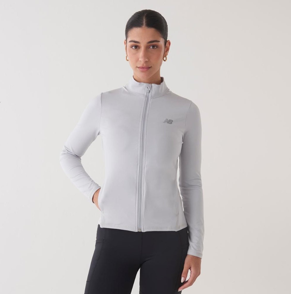 Imagem principal Jaqueta Mesclado Performance Feminina New Balance incolor New Balance incolor