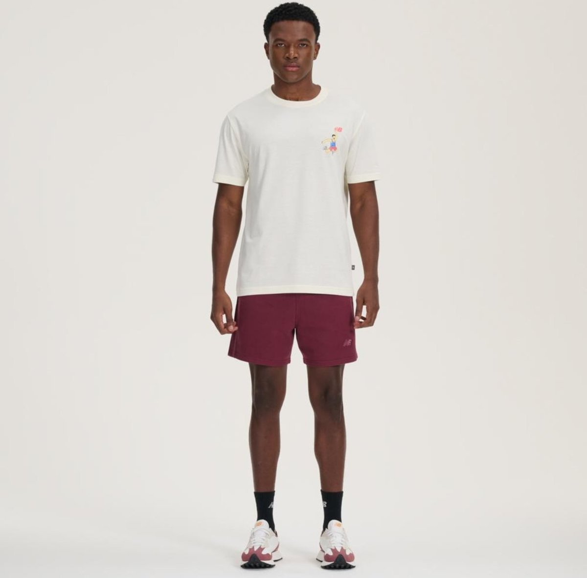 Imagem principal Camiseta Athletics Hoops Cartoon Masculina New Balance incolor New Balance incolor