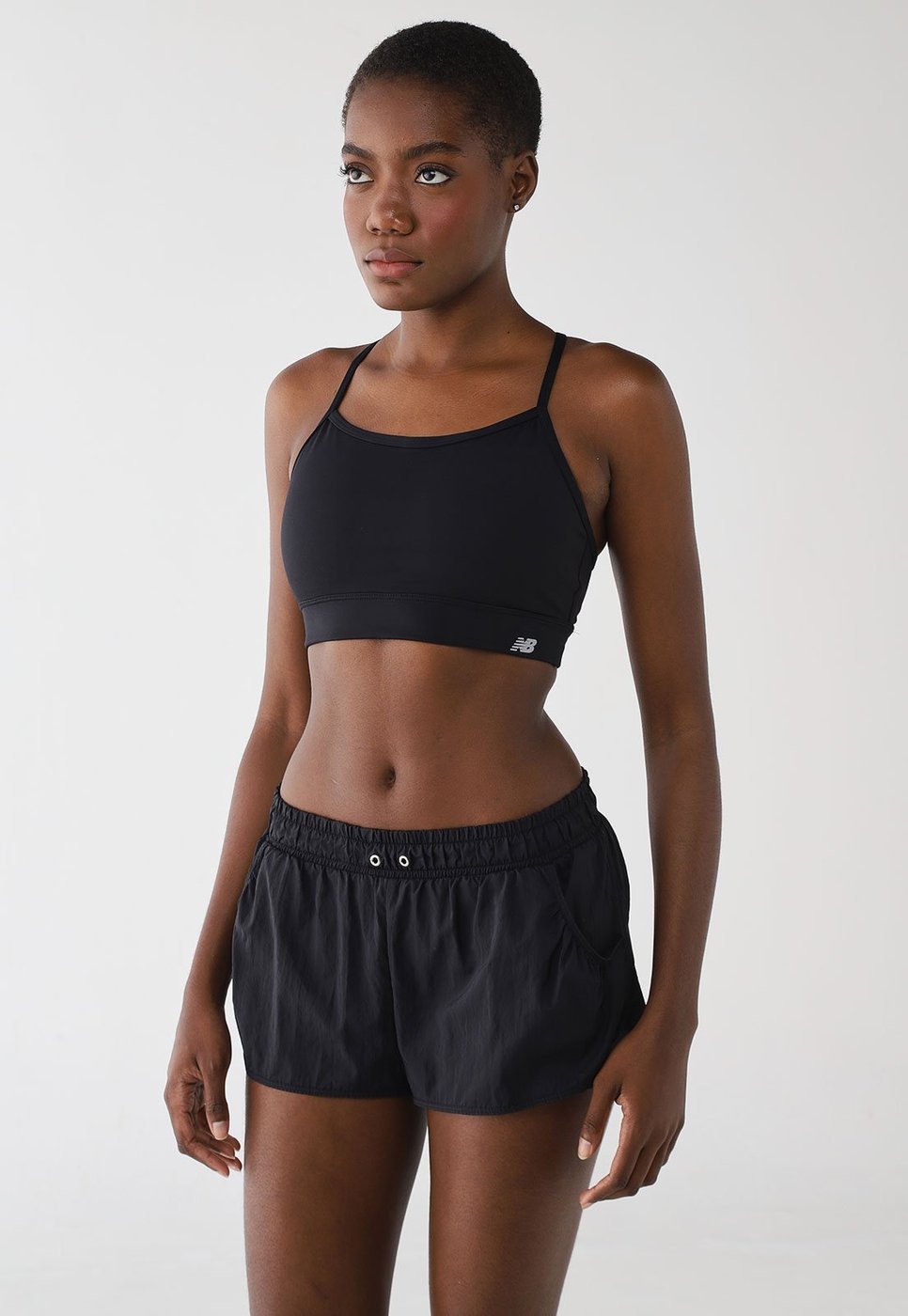 Top Feminino New Balance NB Basic Yoga